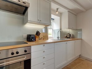 High chair - One-bedroom detached cottage with stunning sea views over the marshes. (Salthouse)