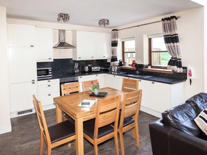 Dishwasher, high chair - One Eden Cottage - UKC6253 (Linlithgow)