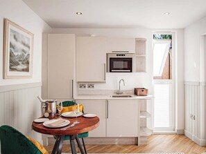 High chair - ’Boutique hotel style’ pod with private terrace and views. (Windermere)