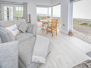 TV, fireplace - Captains Beach House (Aberdesach)