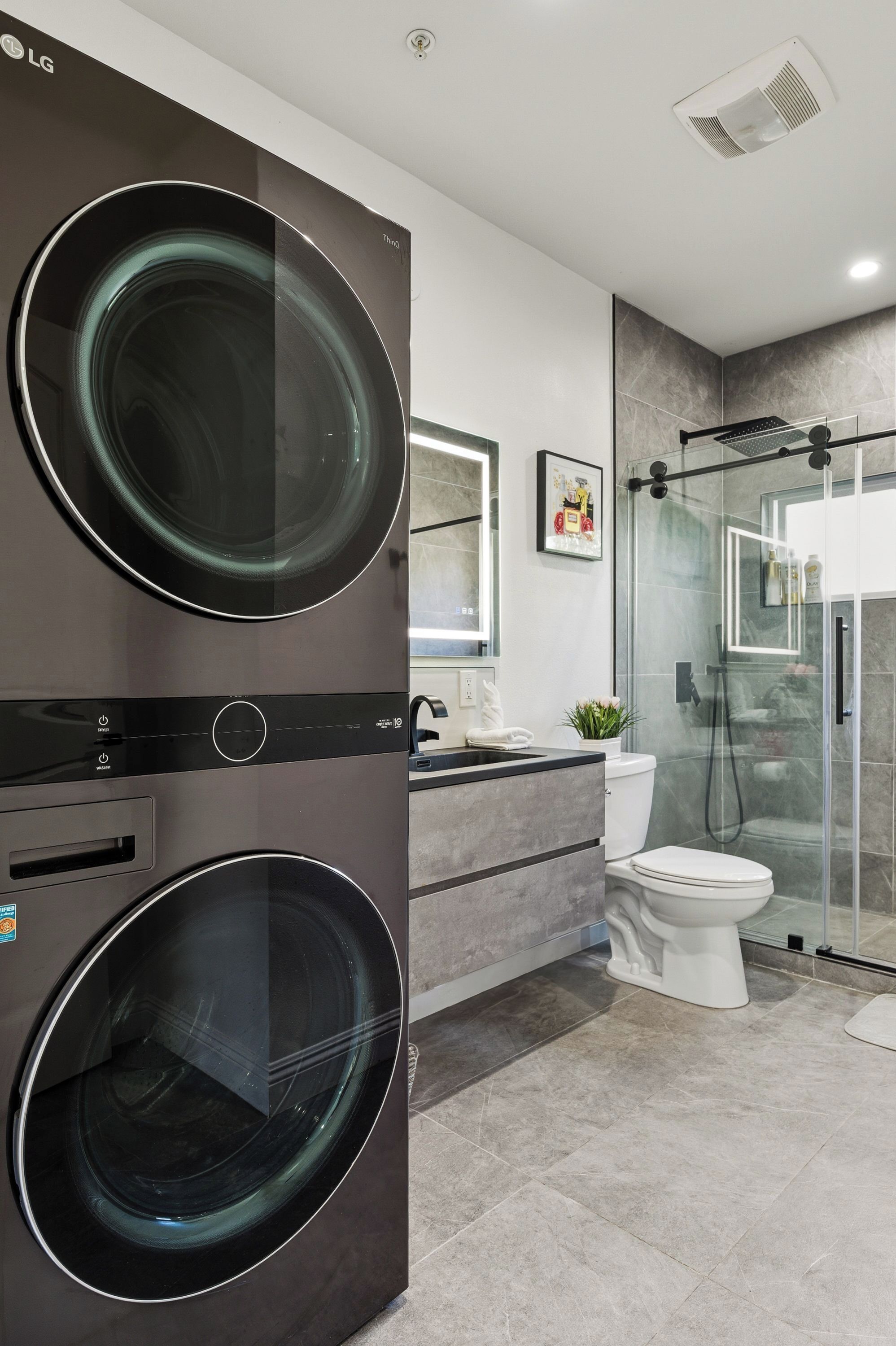 Shower, hair dryer, towels, toilet paper