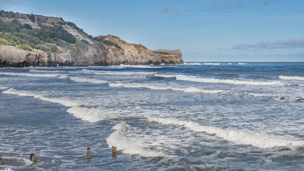 A coastal landscape with rocky cliffs and waves. - 2 bedroom accommodation in Sandsend, near Whitby (Sandsend, near Whitby)