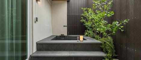 Signature Room | Private spa tub