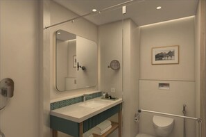 A modern bathroom with a large mirror, a sink, a toilet, and a shower area.
