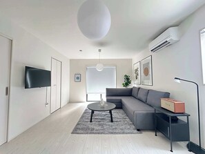 TV, offices - 4BR Modern Home Near Kumamoto Airport by Restavio (Ozu)