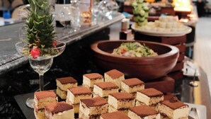 A buffet bar with various desserts and a pineapple garnish. - HALORA NOVA LUXURY CRUISE (Bai Chay)
