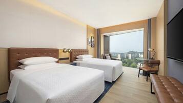 Quarto superior, 2 camas de casal, vista para o jardim
