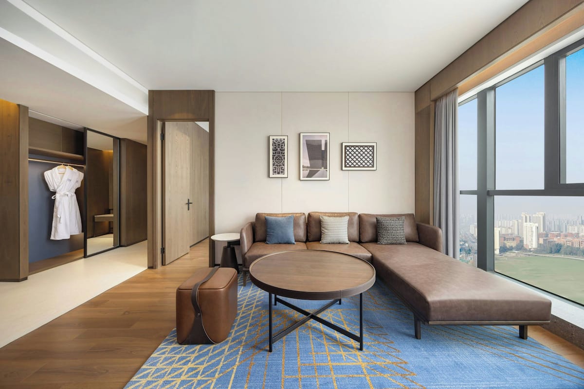 Superior Suite, 1 King Bed, City View | Living room