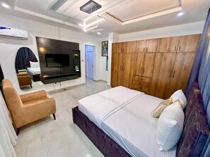 Deluxe Apartment, Balcony, City View | In-room safe, desk, laptop workspace, blackout drapes - Arusha By SPL (Abuja)