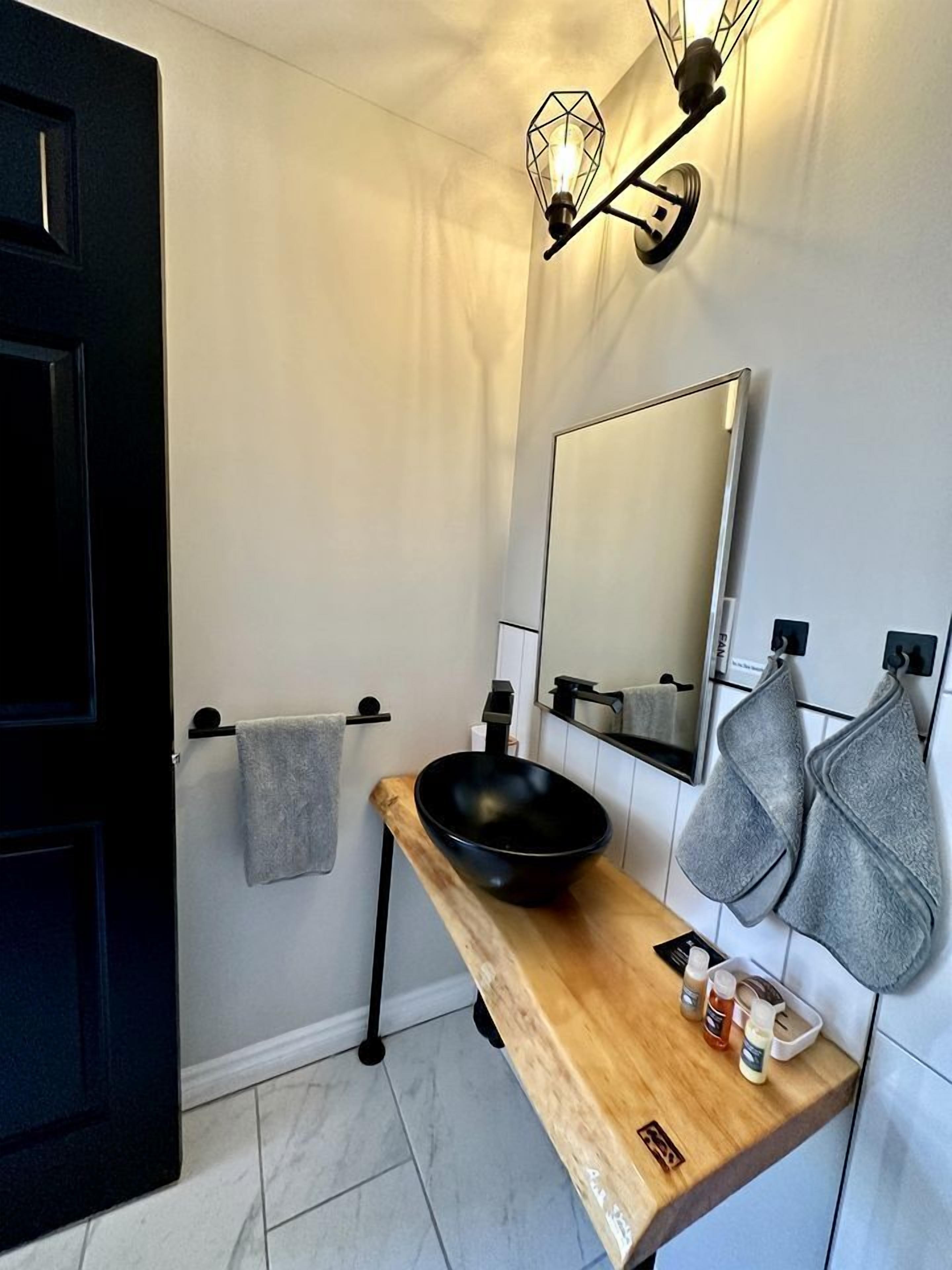 Hair dryer, towels, soap, shampoo