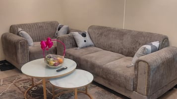 Deluxe Apartment, Balcony, City View | Living area