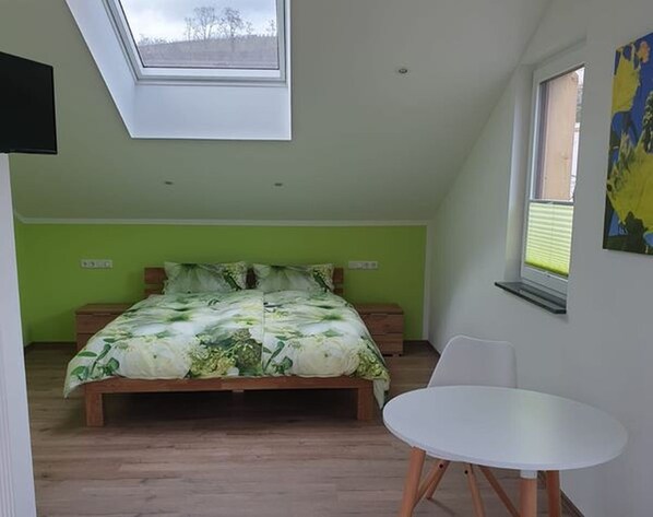 Desk, laptop workspace, blackout curtains, soundproofing