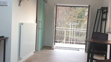 Desk, laptop workspace, blackout drapes, soundproofing