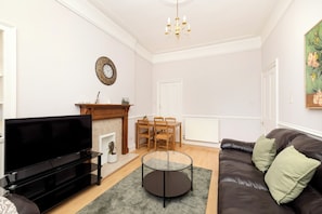 Apartment | Living area | 24-inch Smart TV with digital channels - Elegant 2-Bed Flat with Edinburgh Charm (Edinburgh)