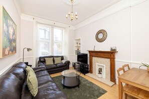 Apartment | Living area | 24-inch Smart TV with digital channels - Elegant 2-Bed Flat with Edinburgh Charm (Edinburgh)