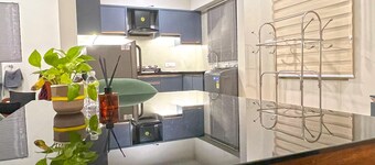 Cozy 1-bedroom apartment in charming Kakkanad with AC