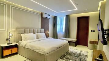 Comfort Apartment, Balcony, City View | In-room safe, desk, laptop workspace, blackout drapes