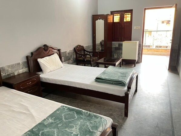 Economy Double Room | Blackout drapes, iron/ironing board