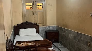 Basic Single Room | Blackout drapes, iron/ironing board