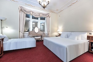 Suíte executiva | Roupas de cama premium, edredons de pluma, camas Select Comfort