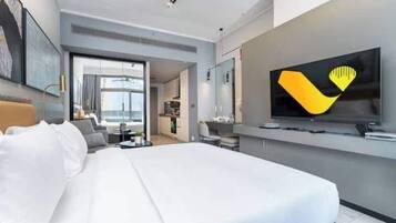 Luxury Studio, Balcony, City View | Laptop workspace, iron/ironing board, cots/infant beds, free WiFi