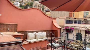 Departamento Deluxe, vista al mar | Terraza o patio