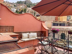 Departamento Deluxe, vista al mar | Terraza o patio