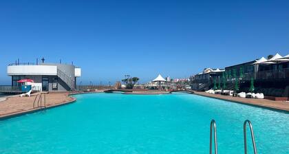 Luxe 1BR Cottage 2 minutes away from the beach | Pool | Wi-Fi & Secure Parking.