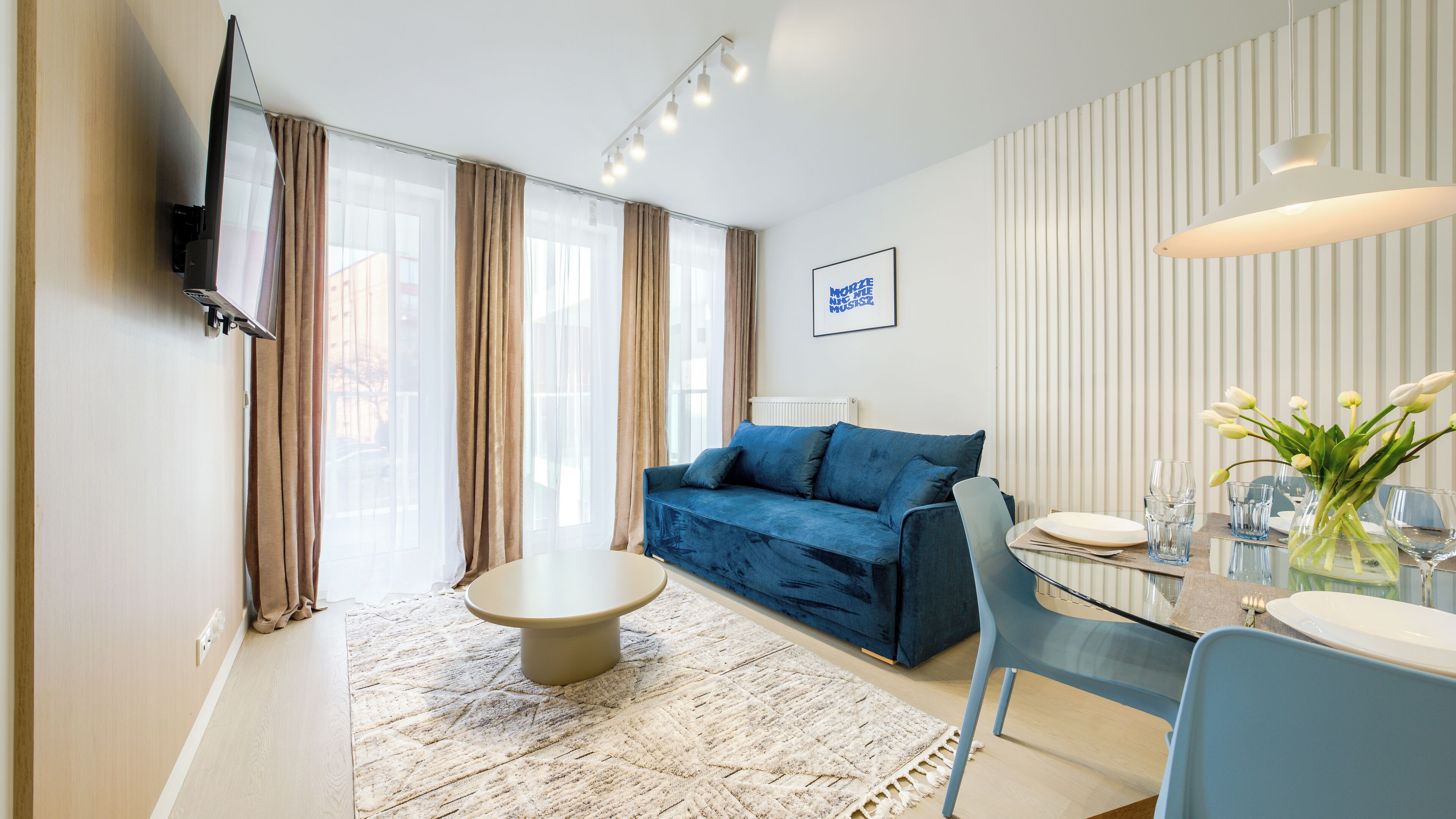 Apartment (114) | Living area | 30-inch flat-screen TV with cable channels
