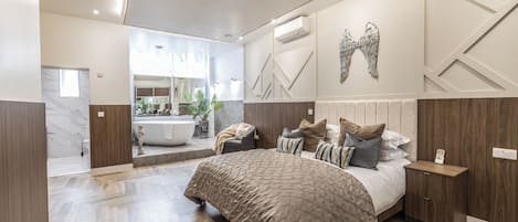 Luxury Apartment, 2 Bedrooms, Bathtub | Premium bedding, individually decorated, individually furnished, desk