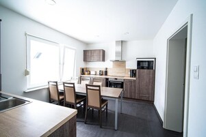 Apartamento, vista para o jardim | Cozinha privada