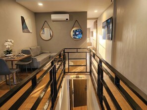 Habitación cuádruple ejecutiva, 2 camas de matrimonio, no fumadores, vistas a la ciudad | Interior