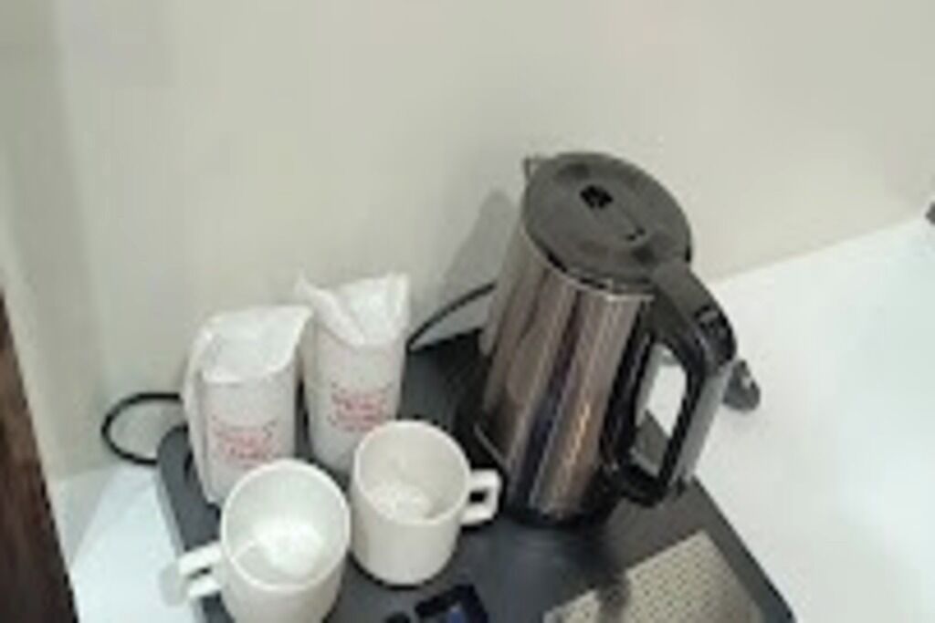 Habitación doble Deluxe, vista a la ciudad | Servicio a la habitación