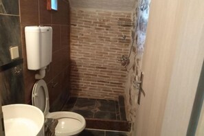 Shower, hair dryer, towels, soap - Panos Stone Tower: One-Bedroom House (Paliros)