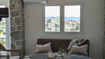 Apartemen Keluarga, balkon, pemandangan laut | Area keluarga | Printer