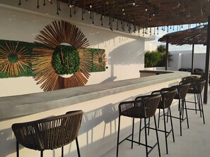 Bar (on property) - Modern 1-bedroom studio in a luxury eco-chic residential community (Q.R.)