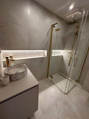 Hair dryer, towels, soap, toilet paper