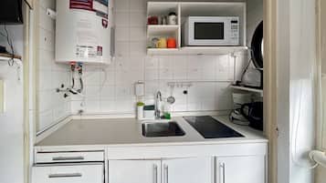 Apartamento, 1 quarto, para fumantes, vista para a cidade | Cozinha privada