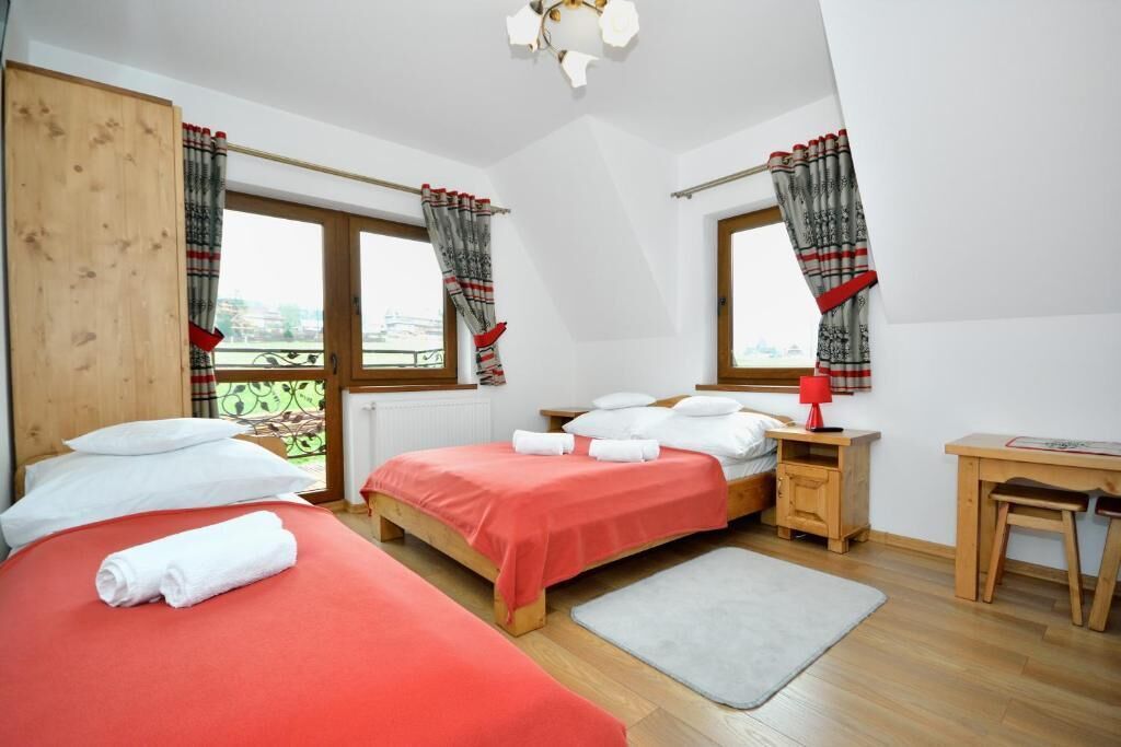 Quarto quádruplo família, sacada, vista para a montanha