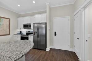 Fridge, microwave, oven, stovetop - Updated condo with pool & steps to village. Enough room for your pup. (St. Simons Island)