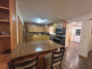 Private kitchen - Trail & Tide Lodge- hot tub, game room basement and multiple gathering areas! (Island Park)