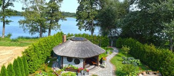 Holiday home with a garden, right by the lake