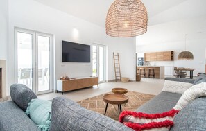 TV, fireplace - Exclusive Modern Villa with Pool, Beach Access & Panoramic Sea Views in Mallorca (Felanitx)
