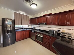 Eenpersoonskamer, uitzicht op tuin | Privékeuken