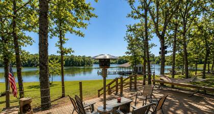 WHISPERING PINES — PRIVATE LAKEFRONT RETREAT ON 240 ACRES
