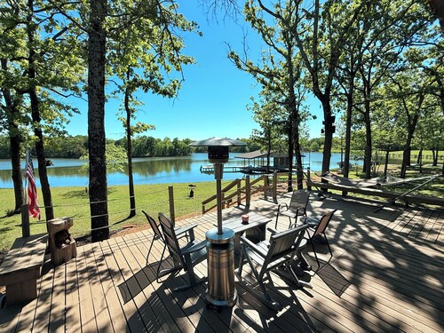 WHISPERING PINES — PRIVATE LAKEFRONT RETREAT ON 240 ACRES