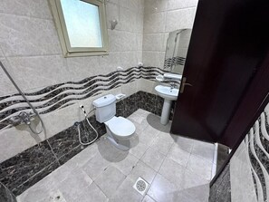 Basic Double Room | Bathroom | Combined shower/tub, hair dryer, towels, soap