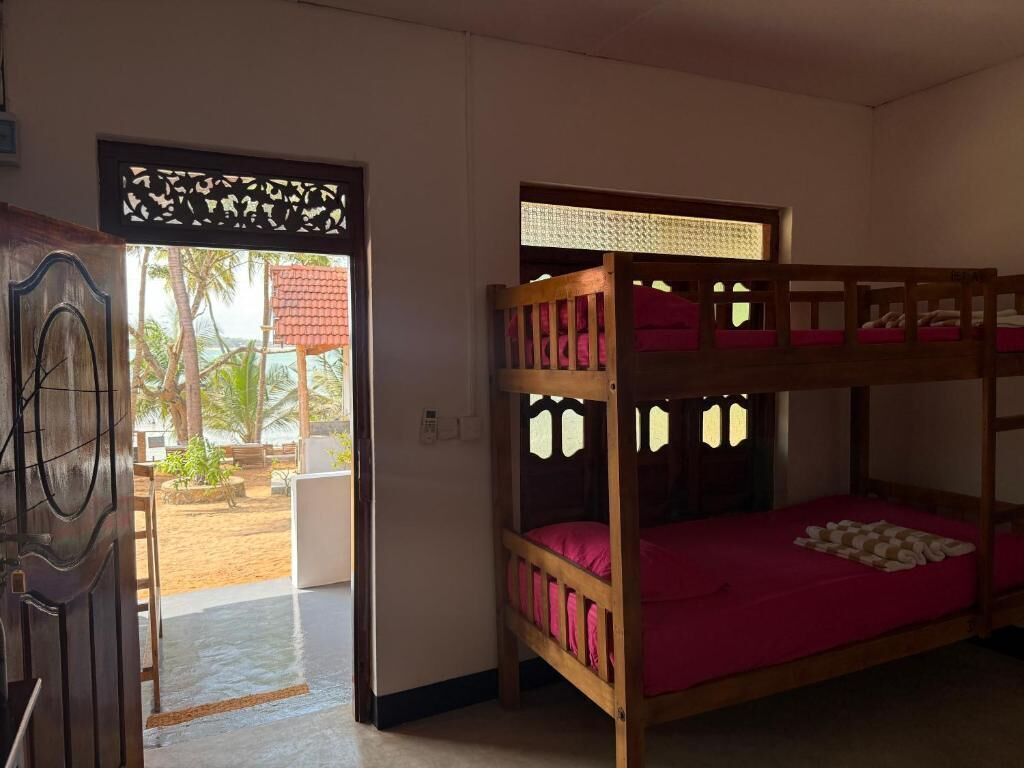 Standardværelse til 3 personer - balkon - strandudsigt