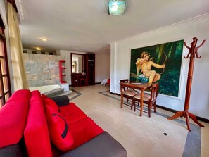 Suíte luxo, varanda, vista para o jardim | Parte interna