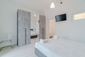 2 slaapkamers, een strijkplank/strijkijzer